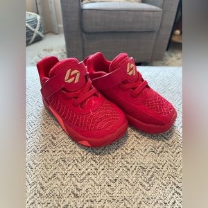 Red toddler Nike sneakers